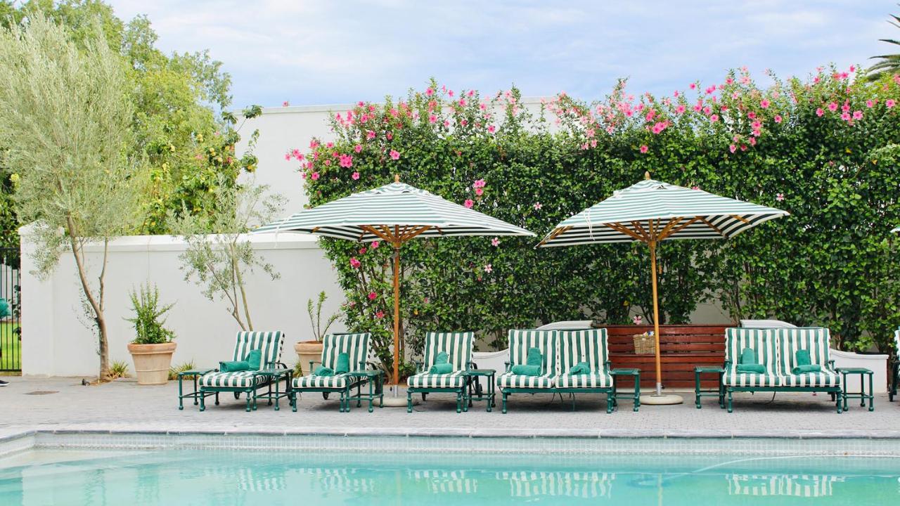 Drostdy Hotel Храфф-Рейнет Экстерьер фото The pool at the Hotel Bel-Air