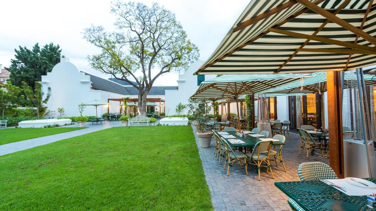 Drostdy Hotel Храфф-Рейнет Экстерьер фото The restaurant at the Cape Heritage
