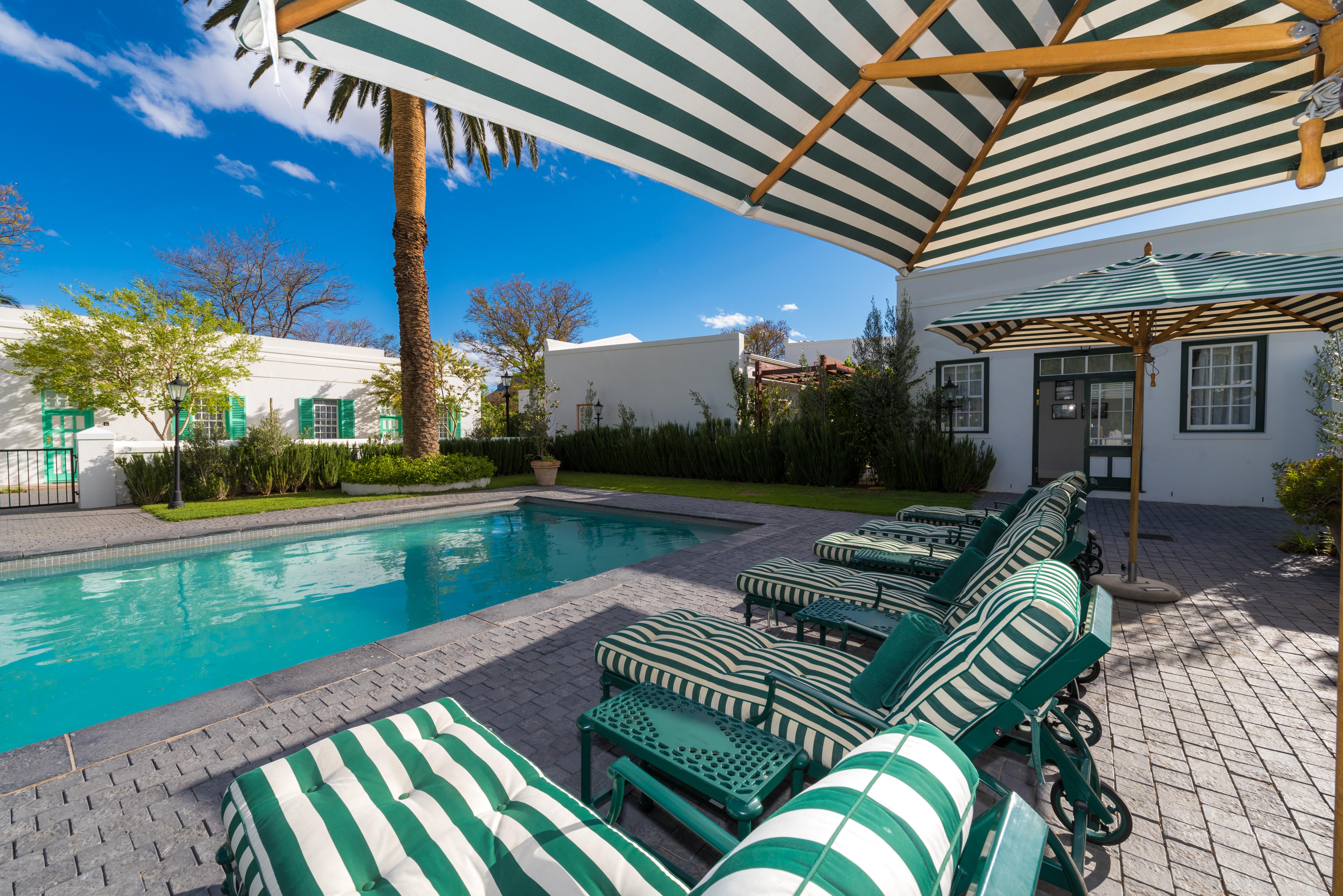 Drostdy Hotel Храфф-Рейнет Экстерьер фото The pool at the Ace Hotel in Palm Springs